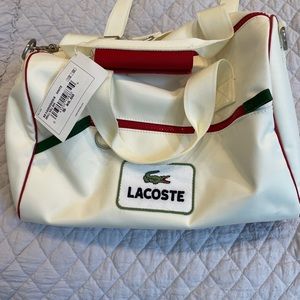 LaCoste NWT travel tote bag with handles & adjustable removable shoulder strap